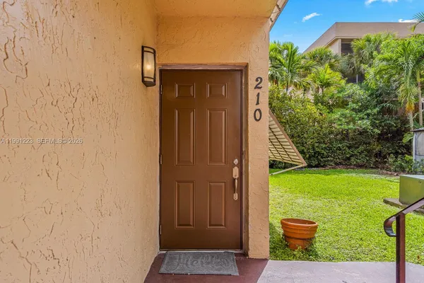 $359,000 | 6854 Northwest 173rd Drive, Unit 210, Hialeah, FL 33015