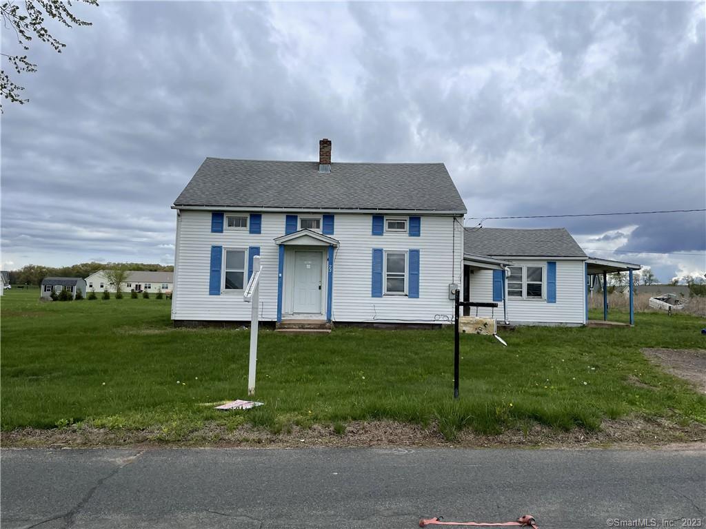 a house view with a outdoor space