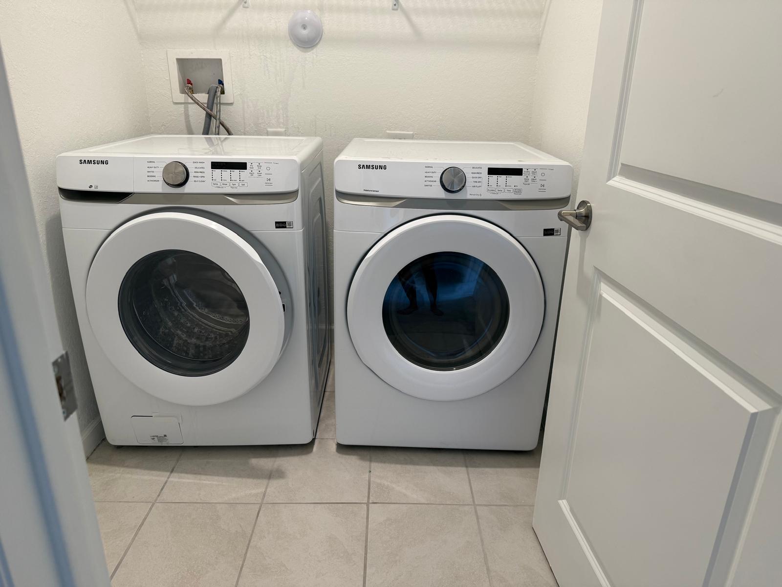 12736 Southwest 211th Street Miami, FL 33177 - Photo 16 of 18 a utility room with dryer and washer