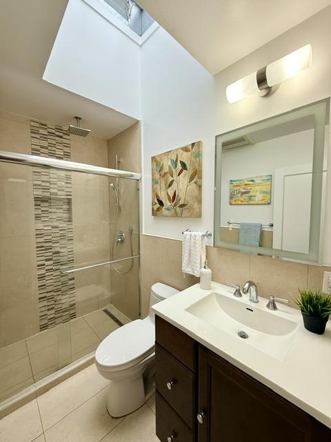 135 Bepler Street Daly City, CA 94014 - Photo 6 of 34 a bathroom with a sink a toilet and shower