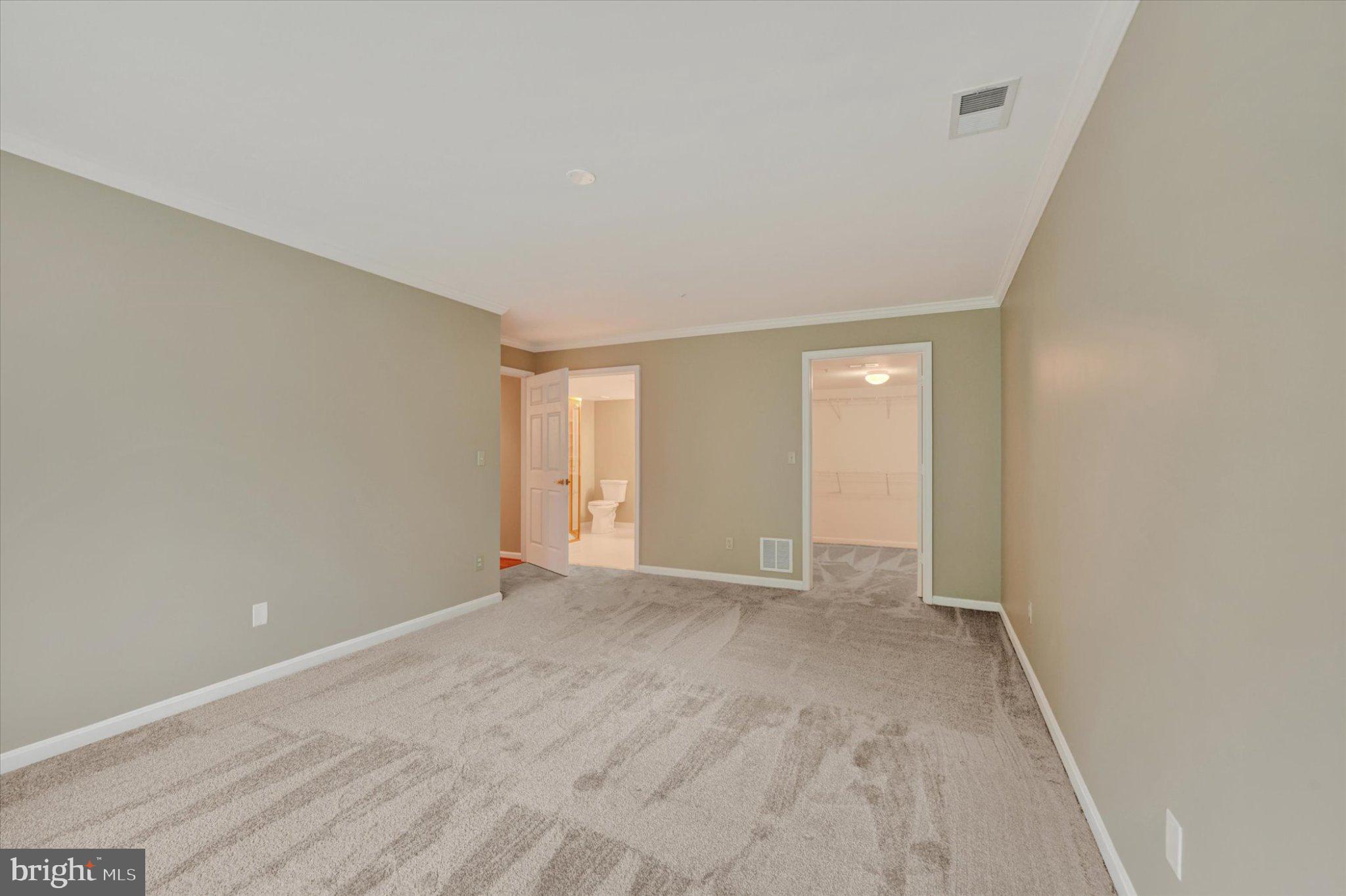 12310 Rosslare Ridge Road, Unit 405 Lutherville-Timonium, MD 21093 - Photo 25 of 36 Spacious room with serene ambiance.