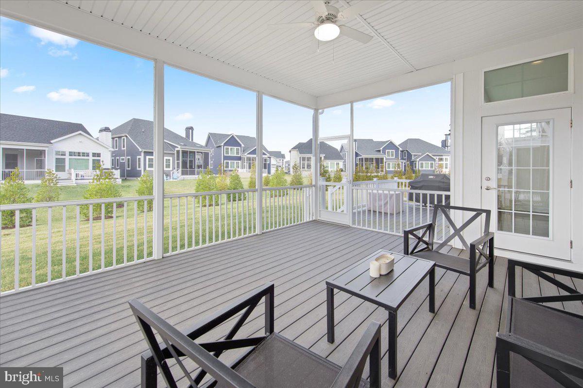 12193 Collins Road Lewes, DE 19958 - Photo 15 of 62 spacious screened porch off he living area