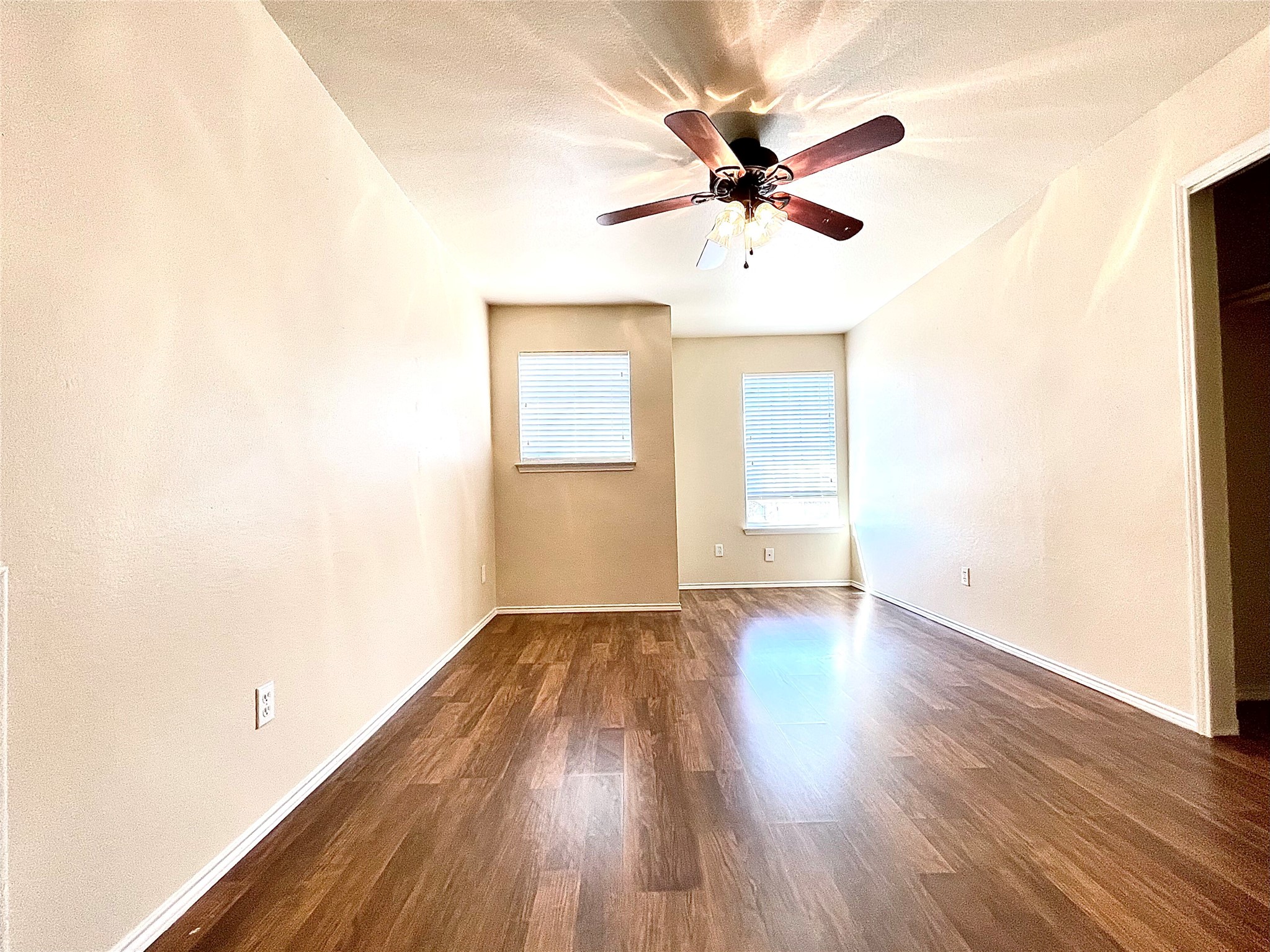 508 Emma Rose Trail Leander, TX 78641 - Photo 25 of 40 Rich hardwood floors complement the neutral walls and provide a spacious feel.