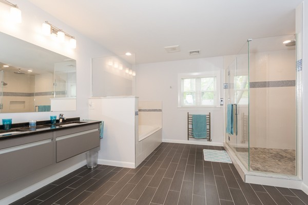 197 Evelyn Road Newton, MA 02468 - Photo 12 of 18 a kitchen with granite countertop a refrigerator and a sink