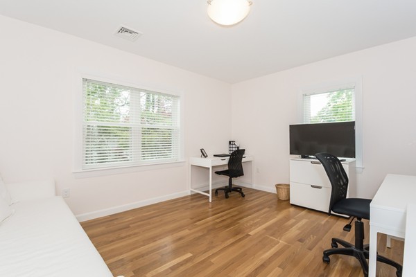 197 Evelyn Road Newton, MA 02468 - Photo 15 of 18 a workspace with furniture hardwood and a window