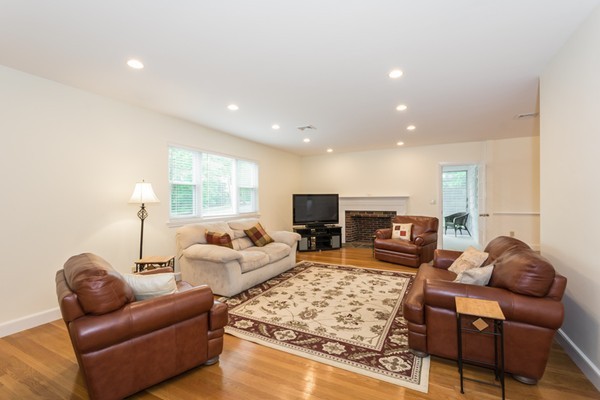 197 Evelyn Road Newton, MA 02468 - Photo 3 of 18 a living room with furniture kitchen view and a large window