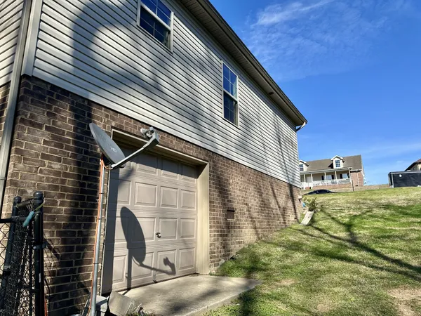 a view of a house with a iron stairs