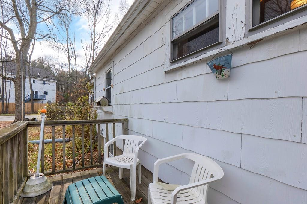 183 South Road Pepperell, MA 01463 - Photo 19 of 27 a view of balcony with wooden floor and outdoor seating
