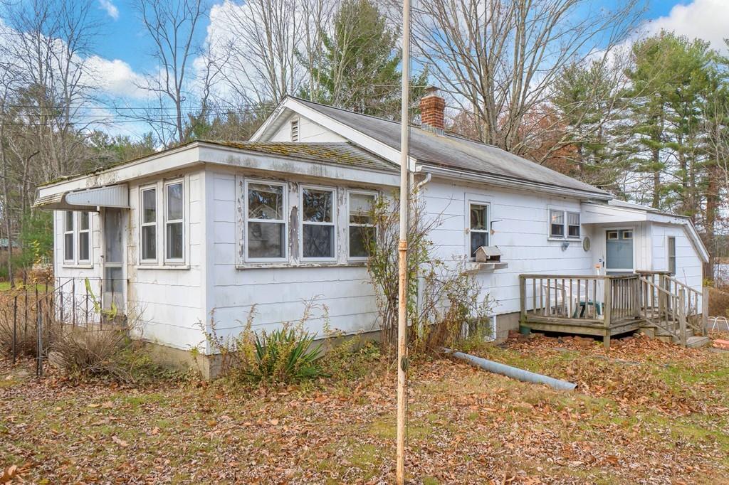 183 South Road Pepperell, MA 01463 - Photo 2 of 27 a front view of a house with a yard