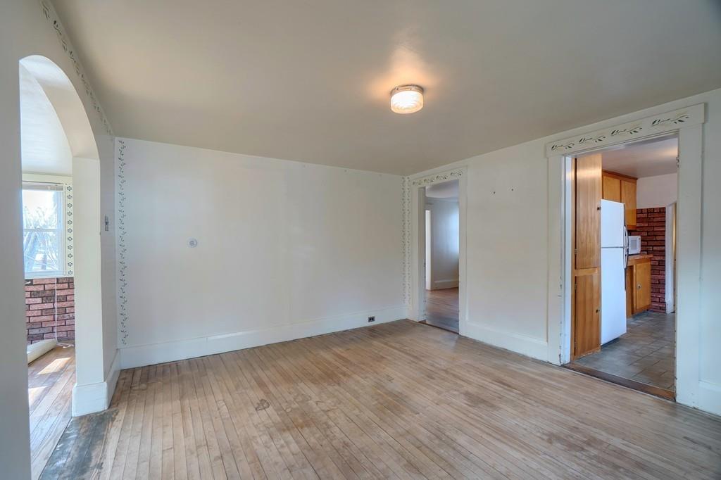 183 South Road Pepperell, MA 01463 - Photo 6 of 27 wooden floor in an empty room with a window