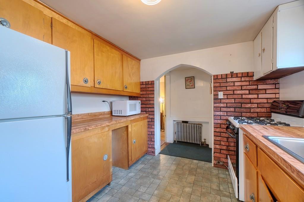 183 South Road Pepperell, MA 01463 - Photo 8 of 27 a kitchen with stainless steel appliances granite countertop a refrigerator a stove and a sink