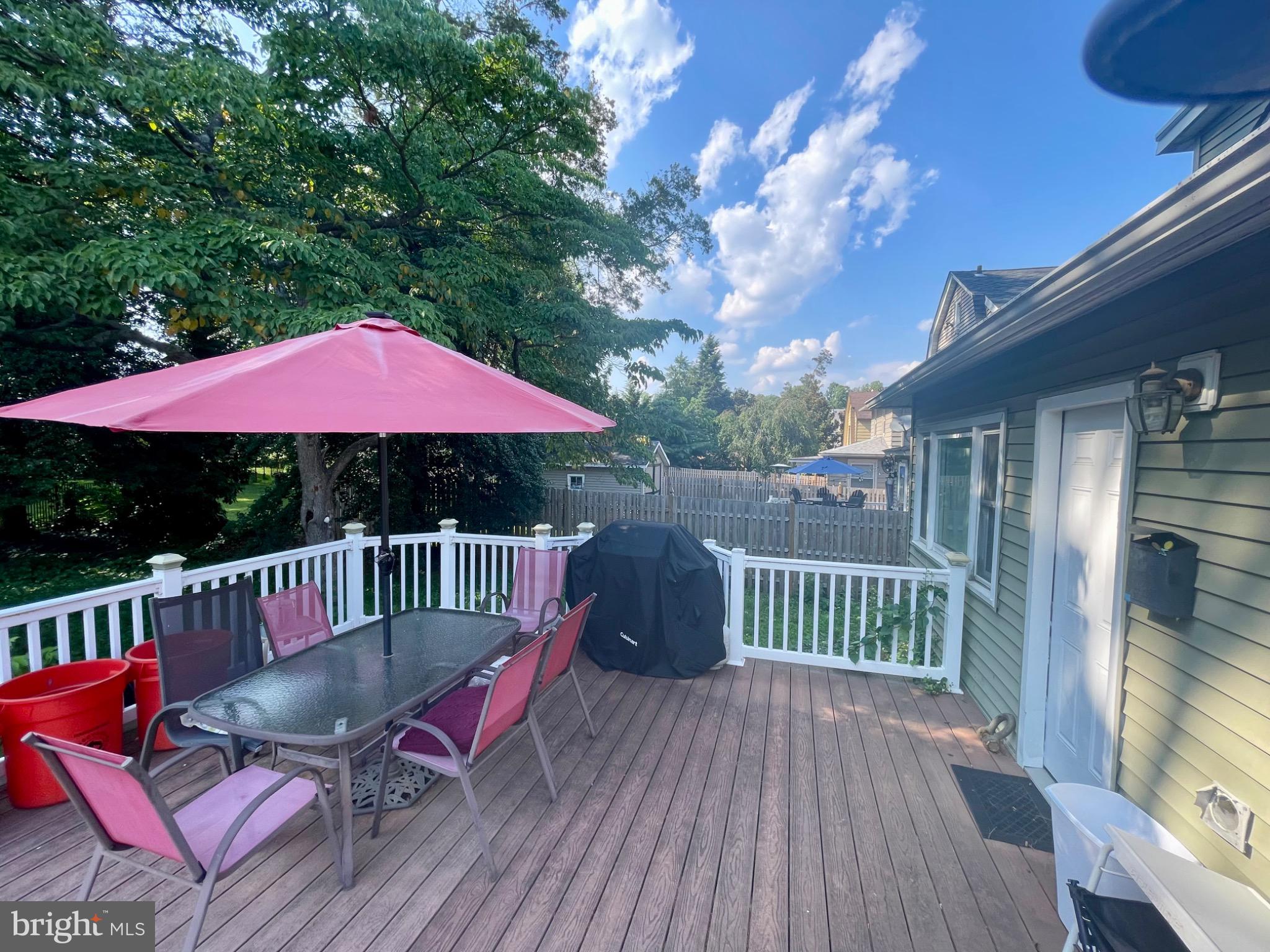 16 Evergreen Lane Haddonfield, NJ 08033 - Photo 4 of 16 a view of a deck with furniture and a backyard