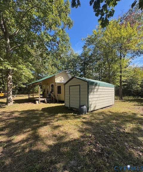 0 Reedy Creek Road Freeman, VA 23856 - Photo 10 of 21 a view of a barn in the middle of a yard