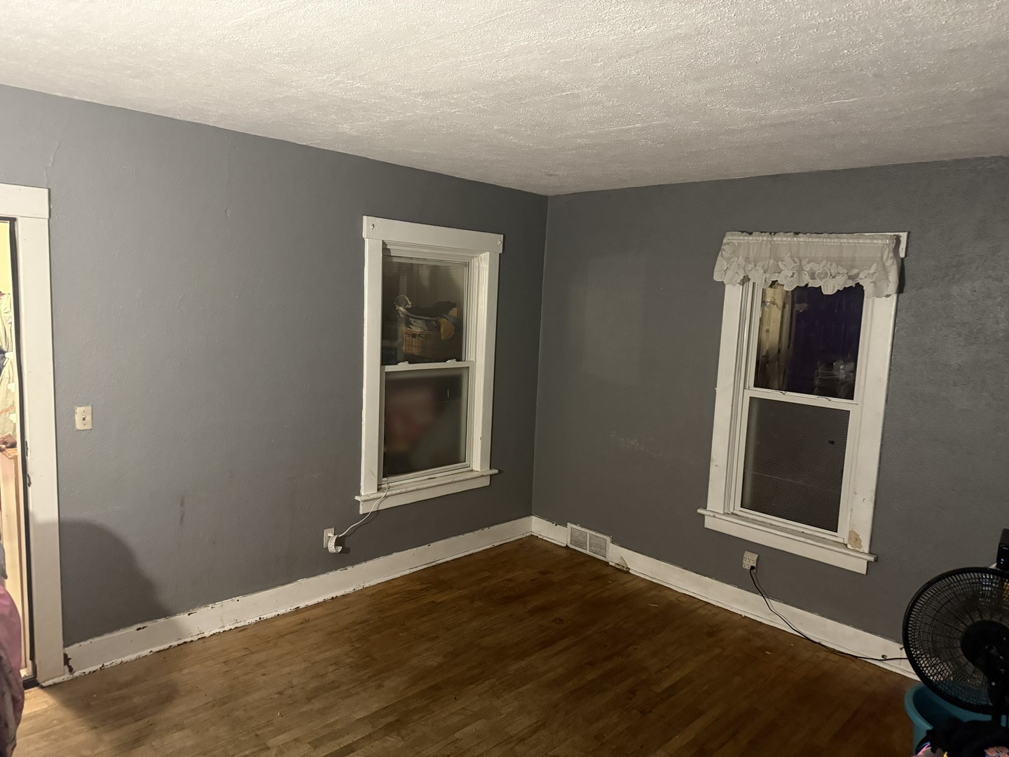 2903 Gideon Avenue Zion, IL 60099 - Photo 8 of 12 a view of empty room with wooden floor and fan