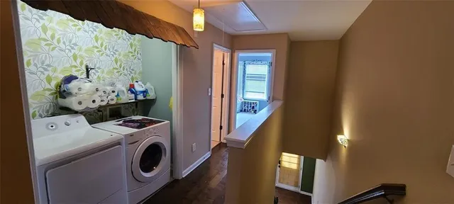 a utility room with dryer and washer