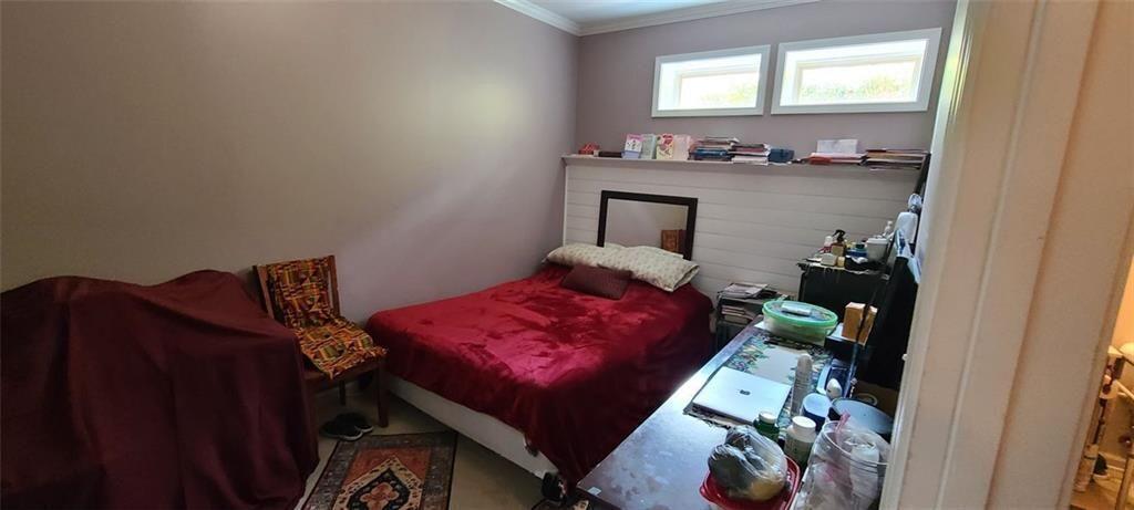 4434 Lassen Court Suwanee, GA 30024 - Photo 30 of 46 a living room with furniture and a window