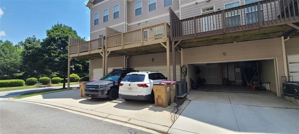4434 Lassen Court Suwanee, GA 30024 - Photo 36 of 46 a car parked in front of a building
