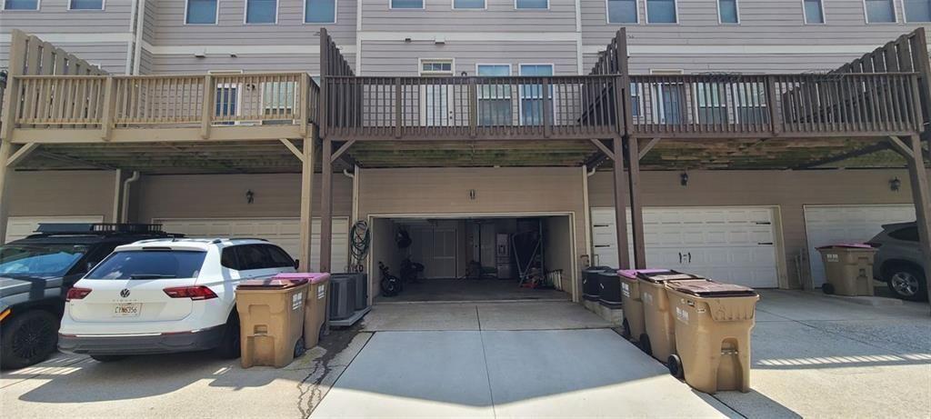 4434 Lassen Court Suwanee, GA 30024 - Photo 37 of 46 a front view of a house with parking space