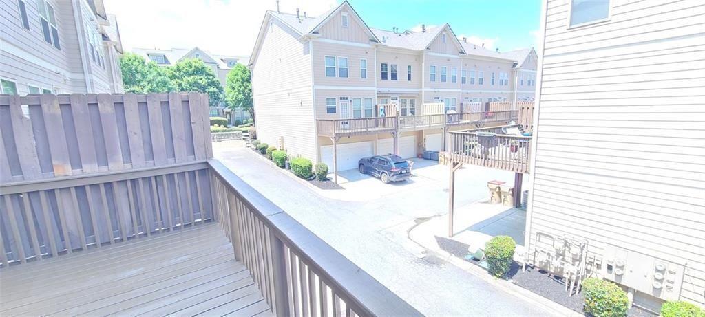 4434 Lassen Court Suwanee, GA 30024 - Photo 44 of 46 a view of balcony with wooden floor