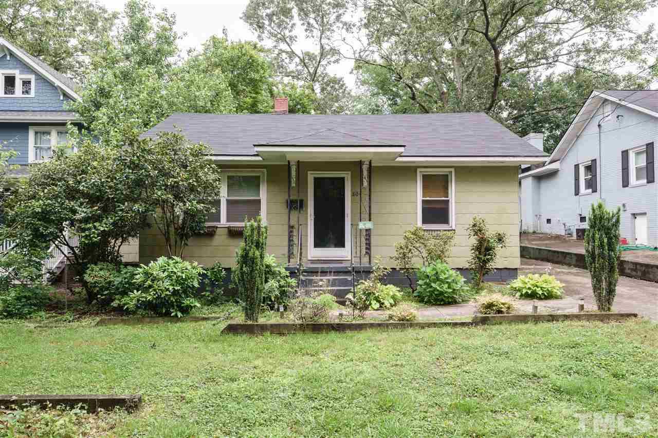 804 Sasser Street Raleigh, NC 27604 - Photo 1 of 15 a front view of a house with a garden