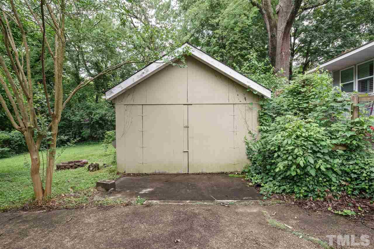 804 Sasser Street Raleigh, NC 27604 - Photo 15 of 15 a view of backyard with large trees and plants