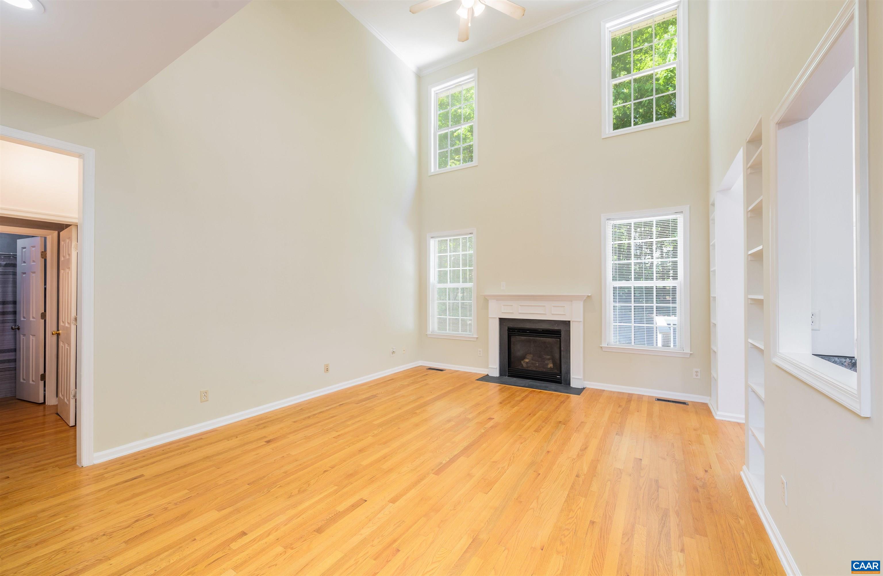 6 Loblolly Road Palmyra, VA 22963 - Photo 13 of 44 a view of empty room with fireplace and wooden floor