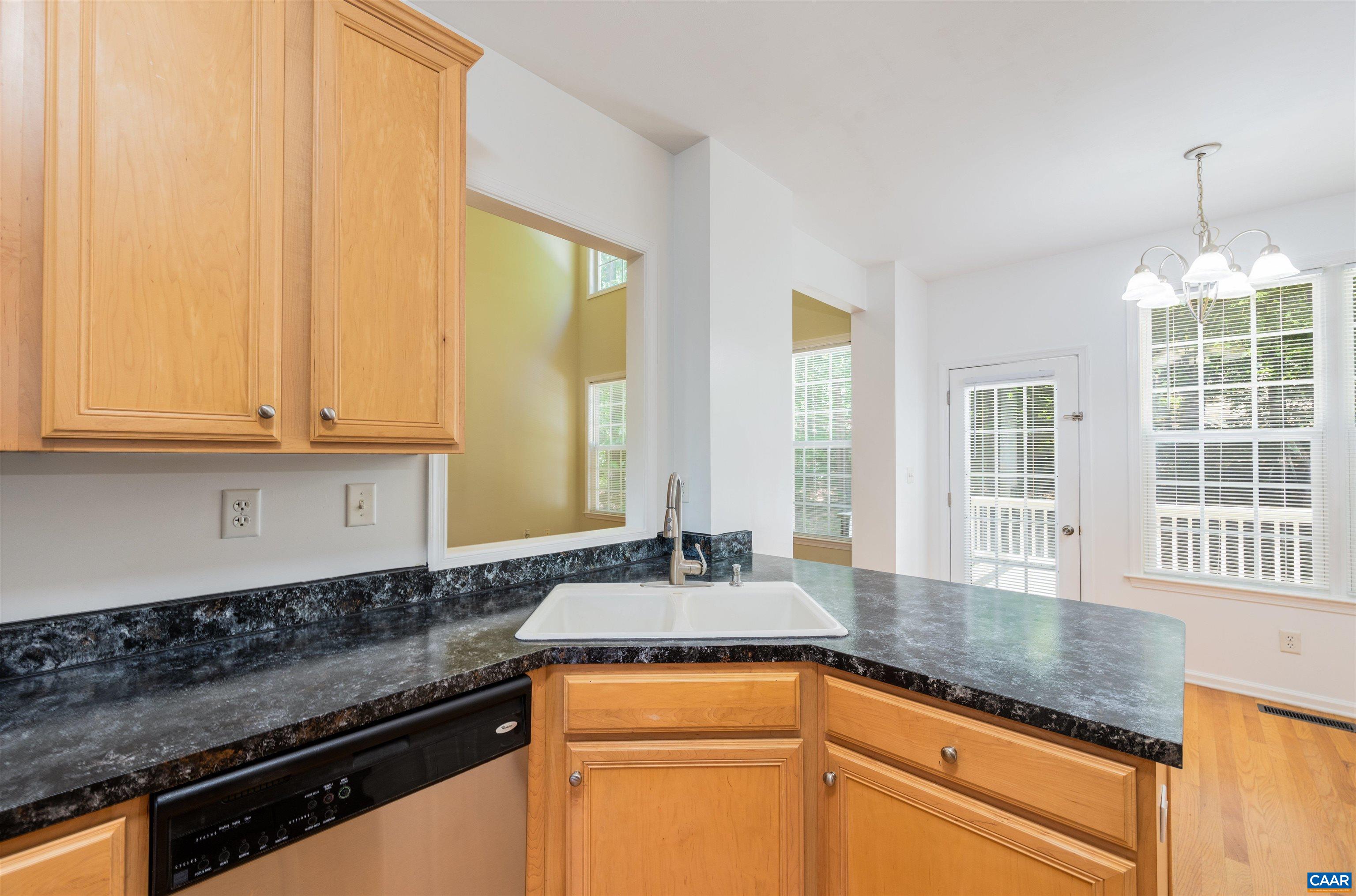 6 Loblolly Road Palmyra, VA 22963 - Photo 15 of 44 a kitchen with granite countertop a sink and a white wooden cabinets