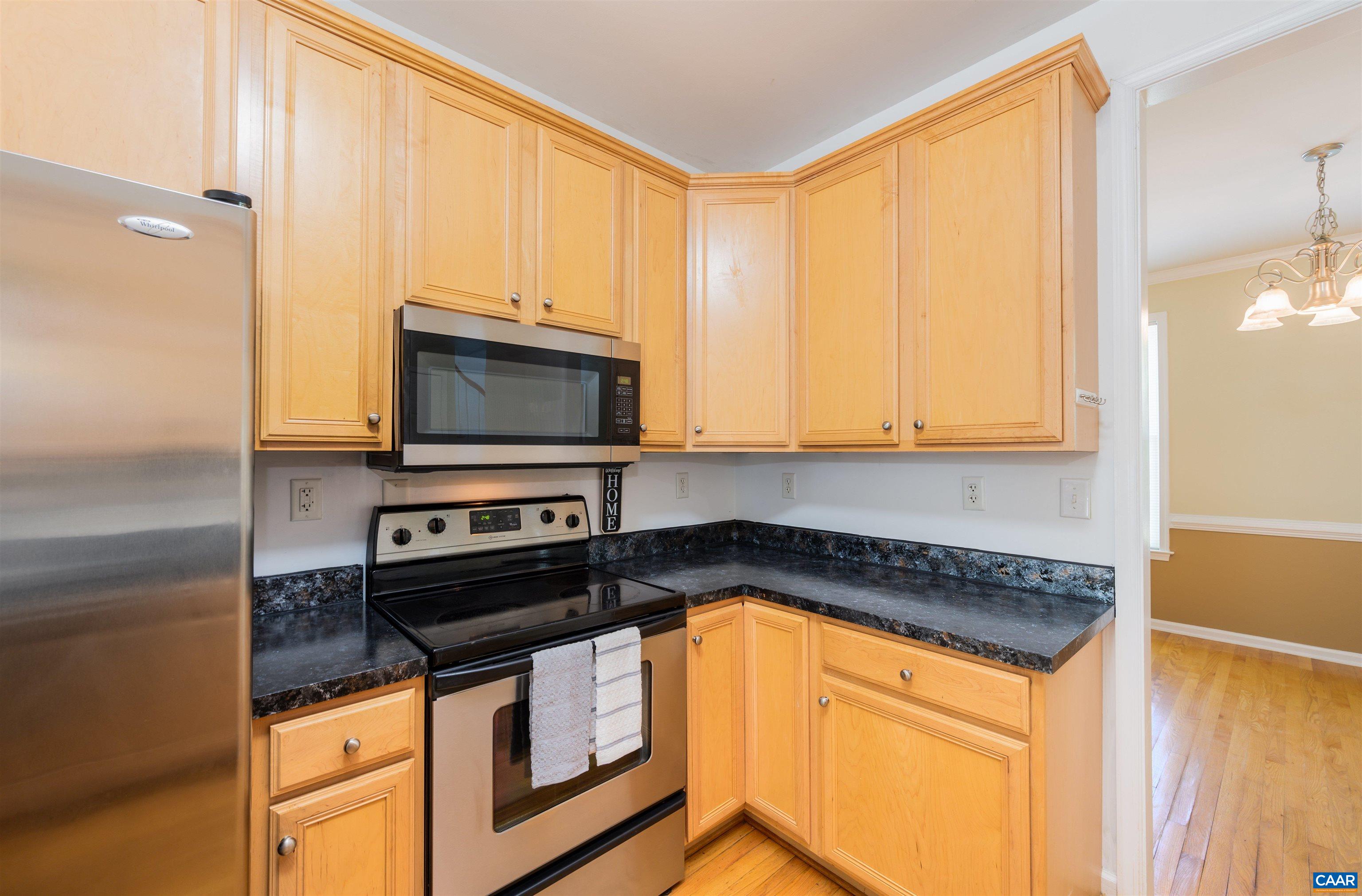 6 Loblolly Road Palmyra, VA 22963 - Photo 16 of 44 a kitchen with stainless steel appliances granite countertop a stove a sink and a microwave