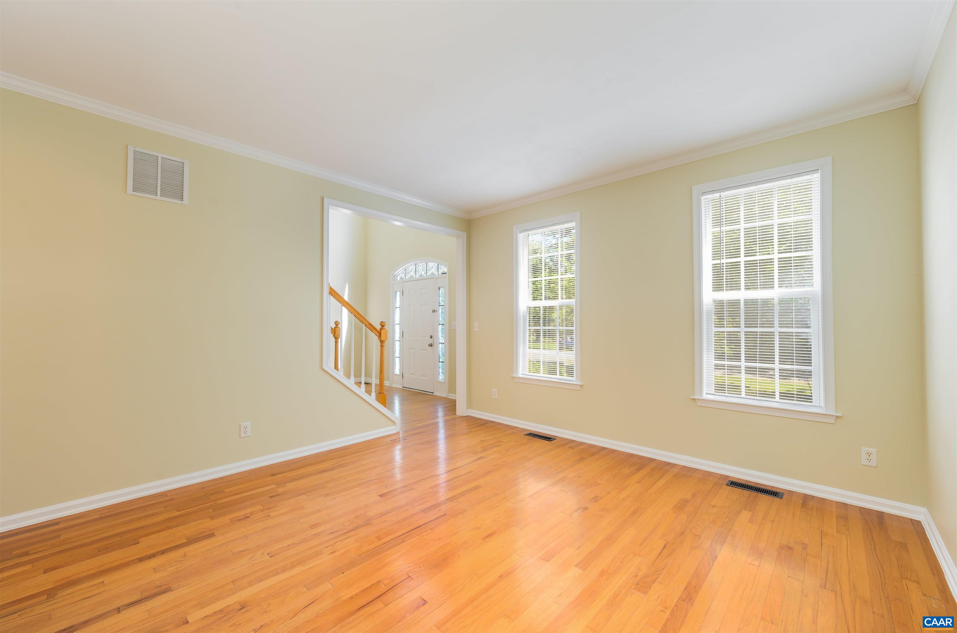 6 Loblolly Road Palmyra, VA 22963 - Photo 23 of 44 an empty room with wooden floor and windows