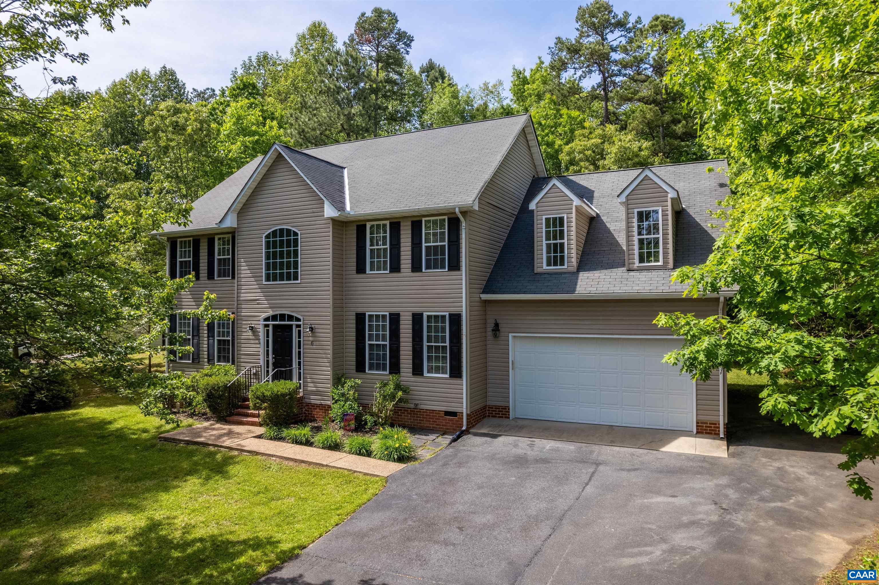 6 Loblolly Road Palmyra, VA 22963 - Photo 39 of 44 a front view of a house with a yard and garage