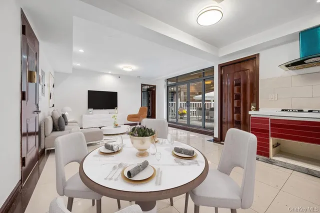a view of a dining room with furniture window and outside view