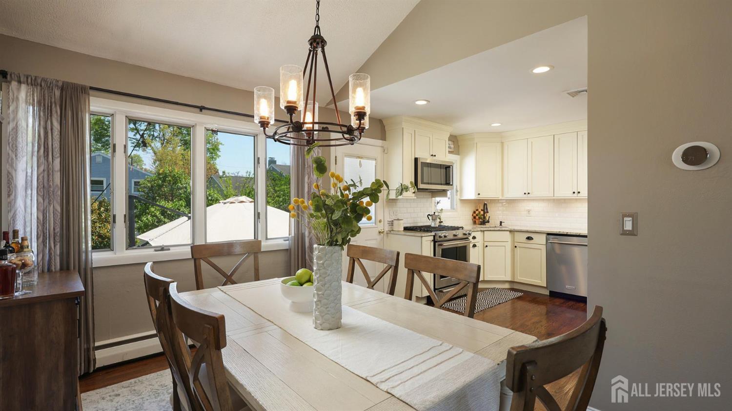 47 Miliken Road Colonia, NJ 07067 - Photo 11 of 40 a view of a dining room and livingroom view