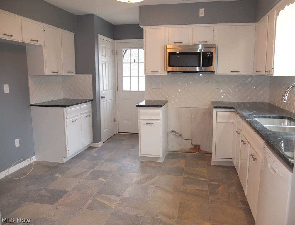 421 Holliston Road Akron, OH 44333 - Photo 6 of 22 Kitchen has a pantry.