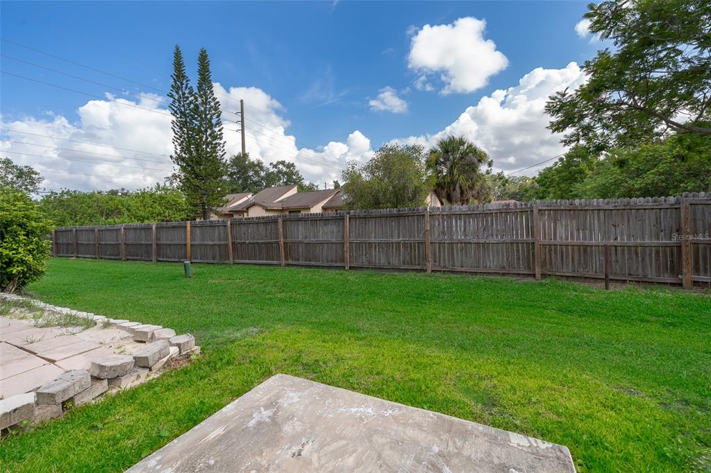 3135 Enclave Court Kissimmee, FL 34746 - Photo 22 of 22 a view of a yard with a trampoline