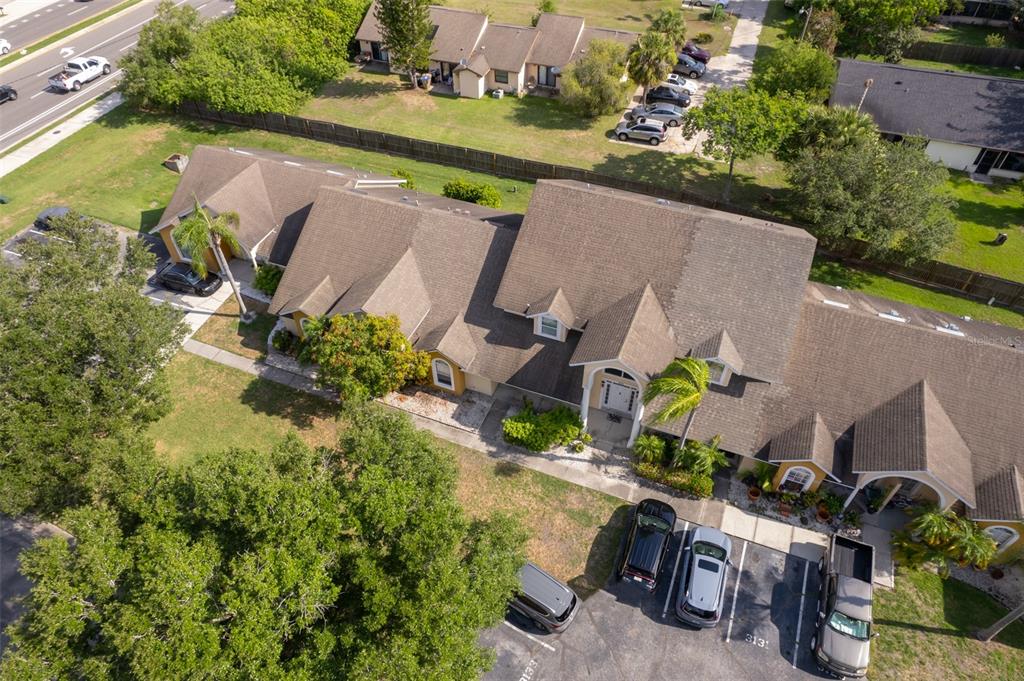 3135 Enclave Court Kissimmee, FL 34746 - Photo 7 of 22 an aerial view of a house with a garden and lake view