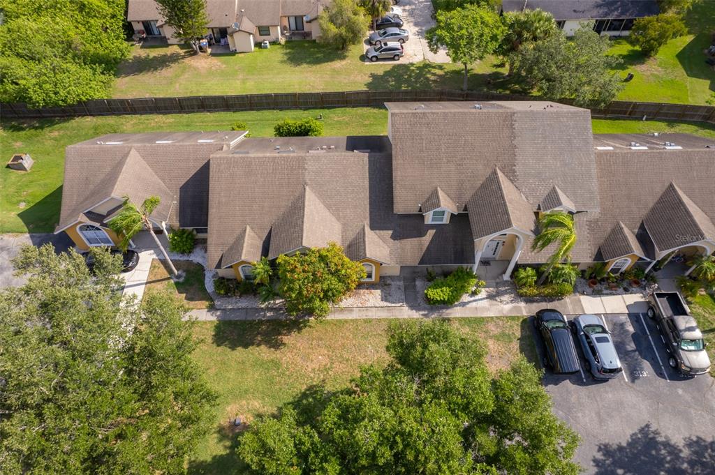 3135 Enclave Court Kissimmee, FL 34746 - Photo 8 of 22 an aerial view of a house with outdoor space and a lake view in back