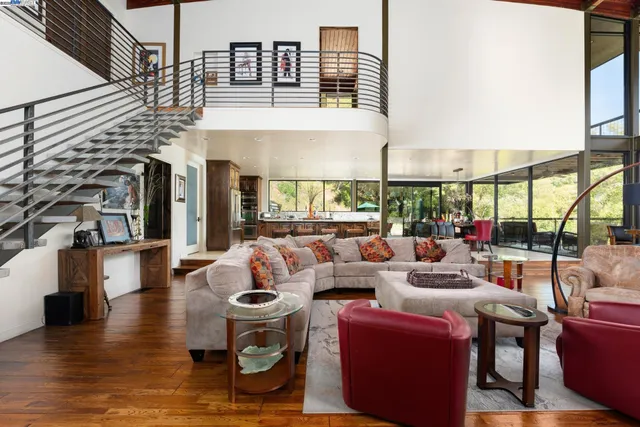a kitchen with stainless steel appliances granite countertop counter space and a large window