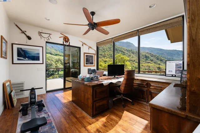 a view of a chair and table in balcony