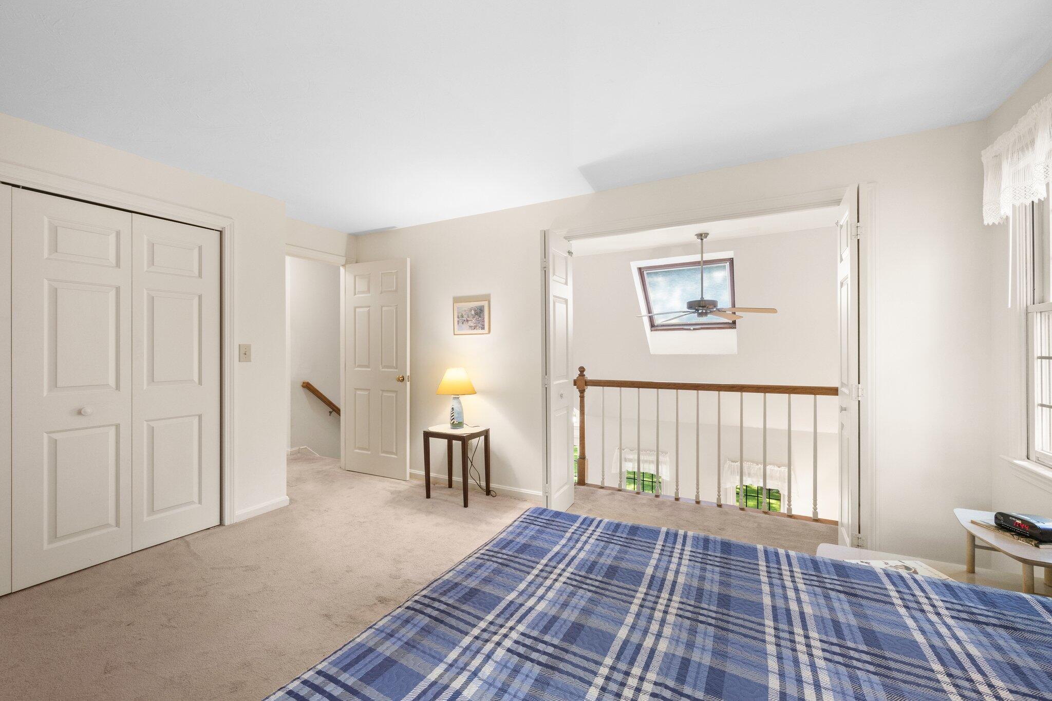 145 Braley Jenkins Road Centerville, MA 02632 - Photo 23 of 33 a view of a bedroom with furniture and windows