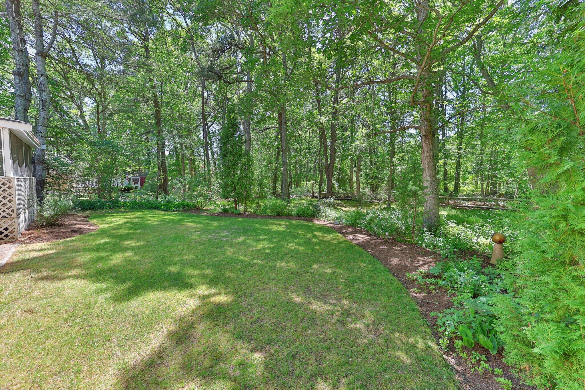 145 Braley Jenkins Road Centerville, MA 02632 - Photo 33 of 33 a view of outdoor space with deck and yard