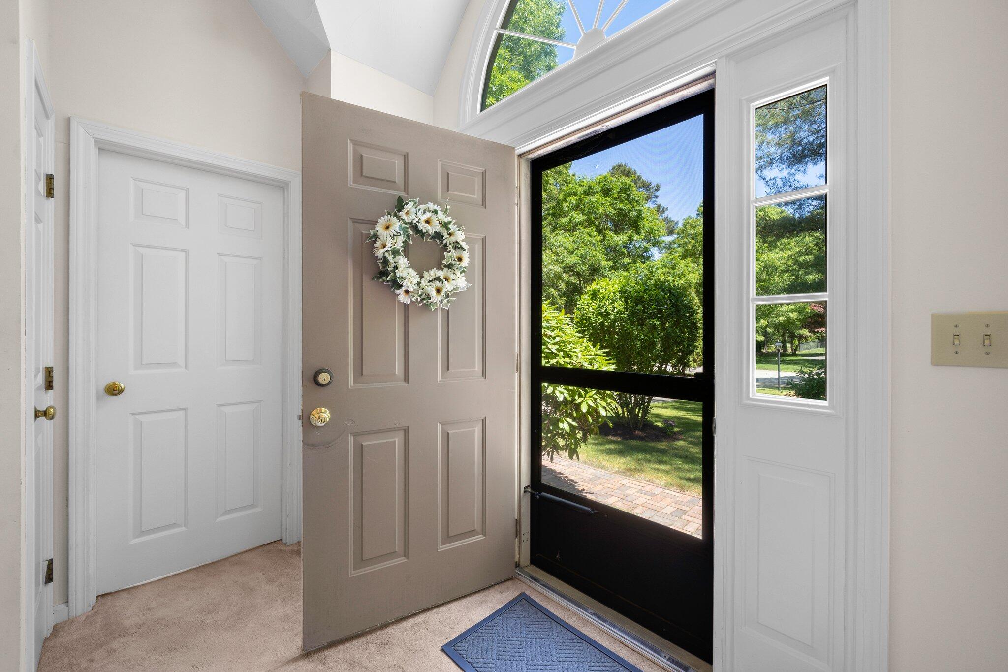 145 Braley Jenkins Road Centerville, MA 02632 - Photo 5 of 33 a view of a large window with an outdoor space
