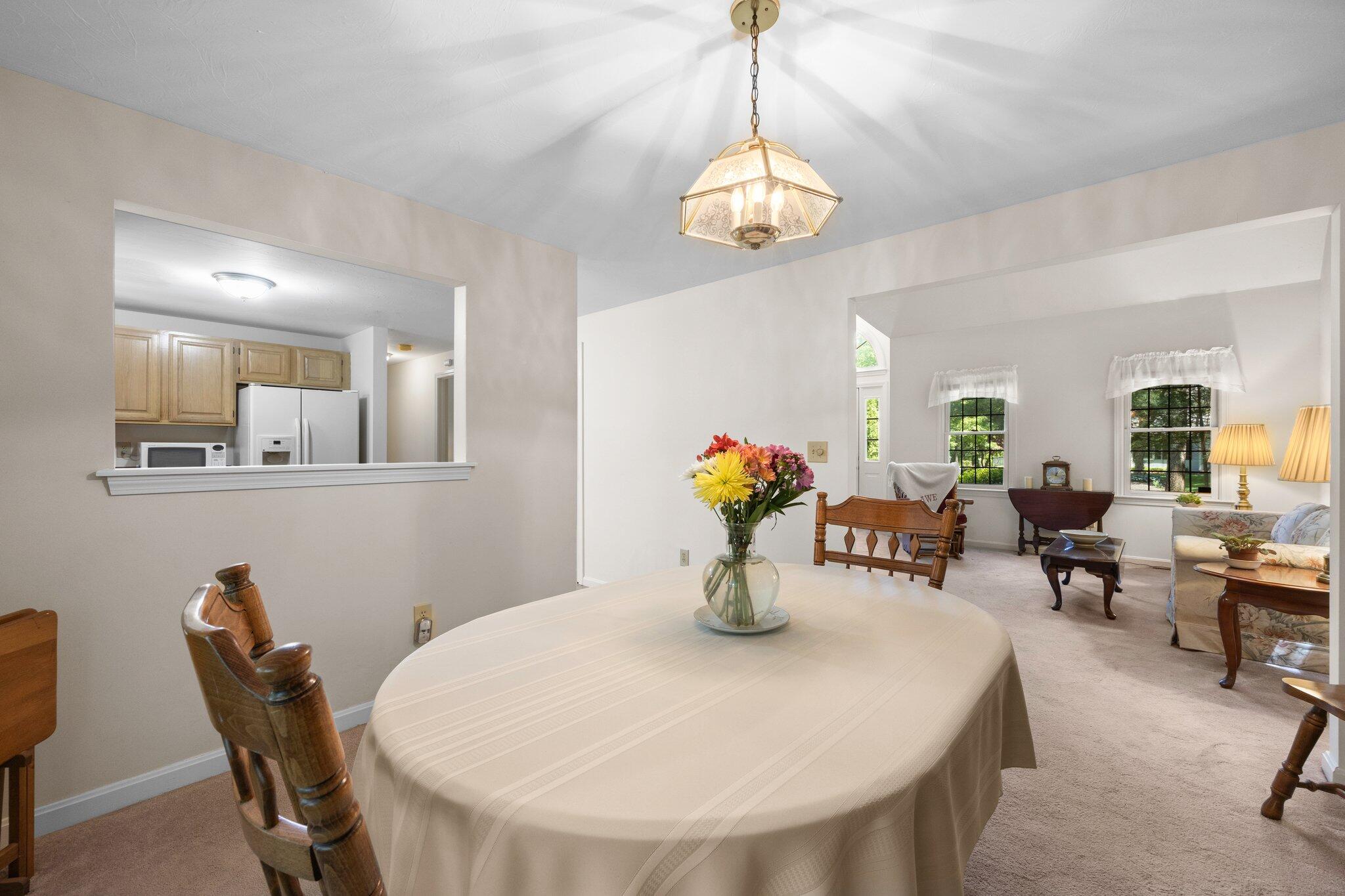 145 Braley Jenkins Road Centerville, MA 02632 - Photo 8 of 33 a view of a dining room with furniture