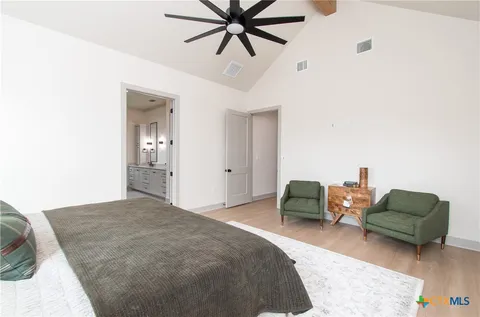 a bedroom with a bed and closet
