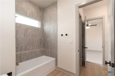 a bathroom with a bathtub