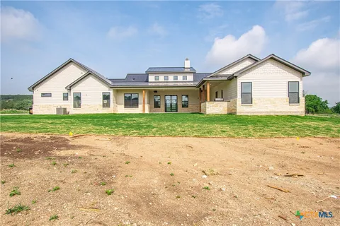 a view of outdoor space yard and front view of house