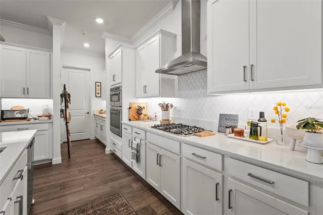 a living room with furniture a ceiling fan and a window