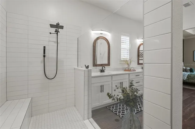 a view of a patio with a table chairs and a yard