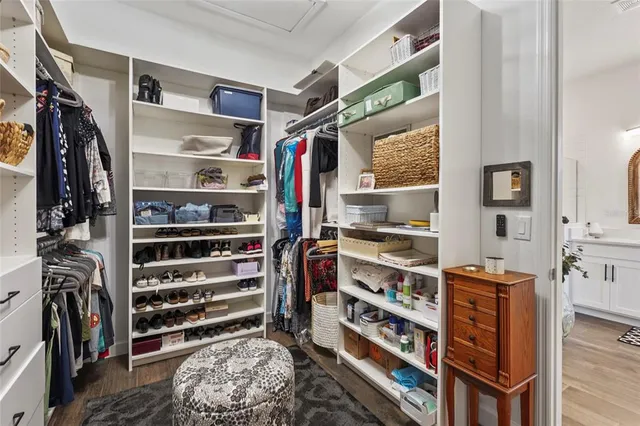 a view of swimming pool with a yard and fence