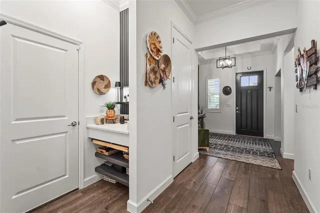 an aerial view of residential houses and outdoor space