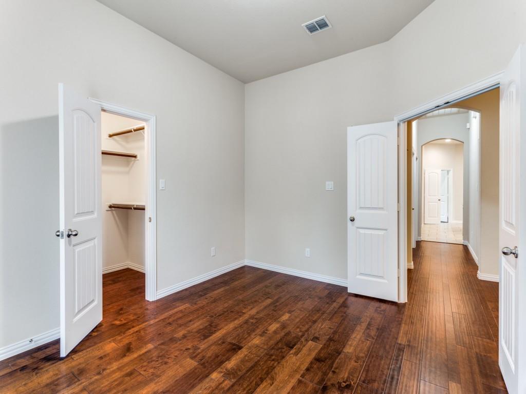 521 Corriente Trail Azle, TX 76020 - Photo 4 of 25 a view of empty room with wooden floor